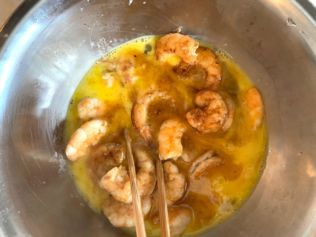 mix shrimp with beaten egg