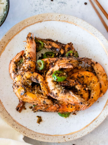 overhead shot of salt and pepper shrimp in plate