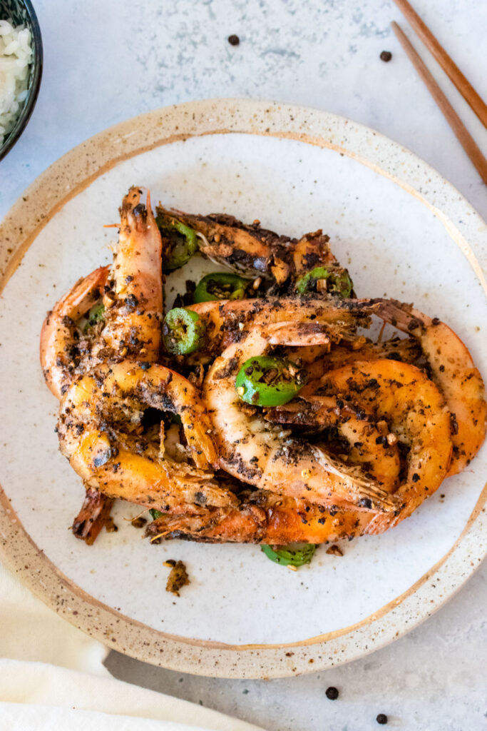 overhead shot of salt and pepper shrimp in plate