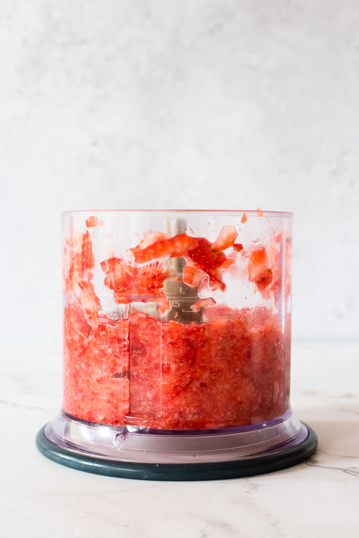 blended strawberries in food processor