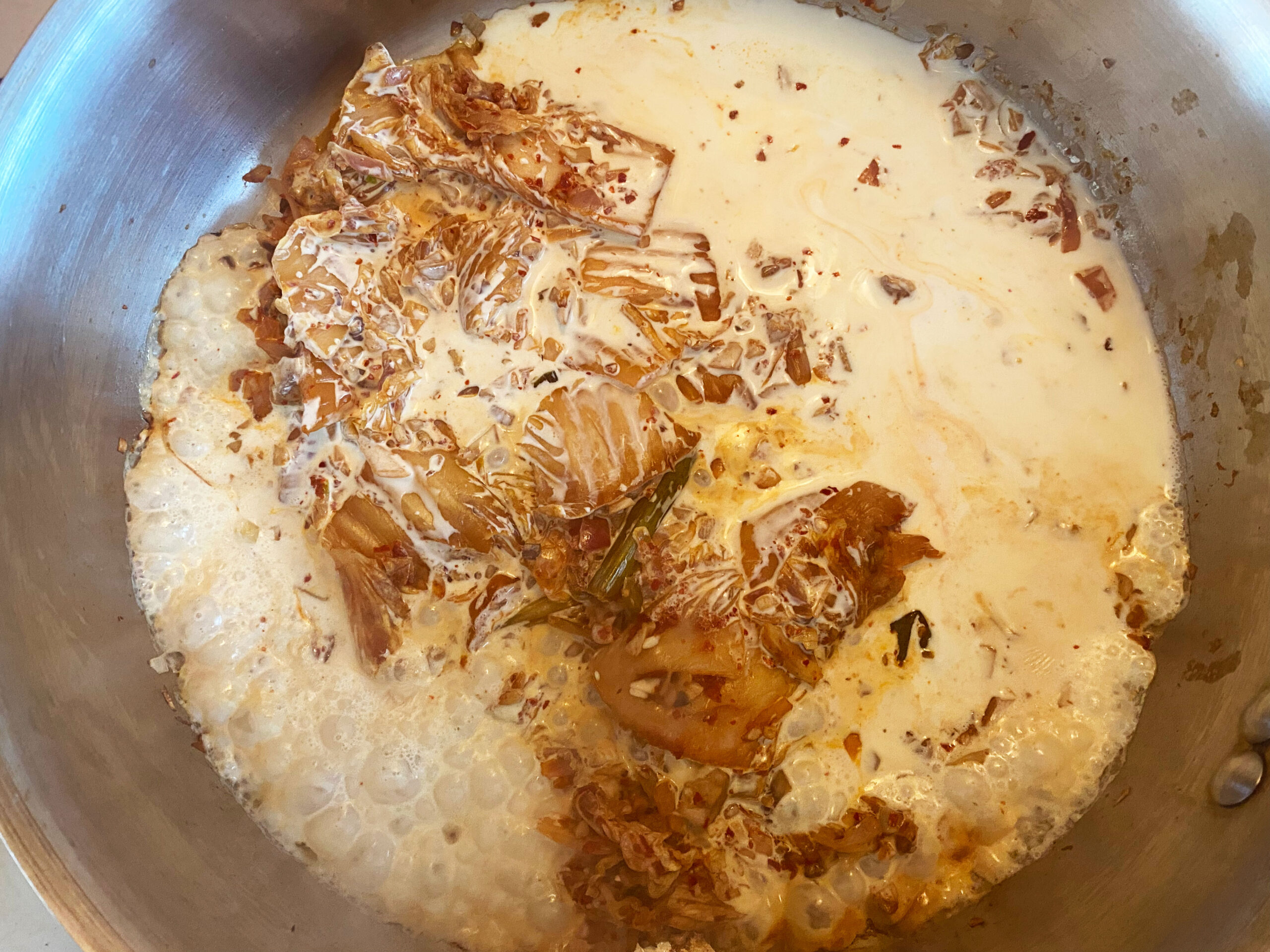 kimchi cooking in heavy cream