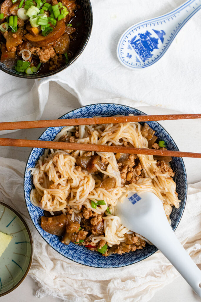 braised eggplant over noodles