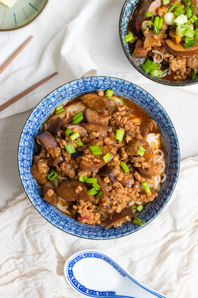 Braised eggplant with minced pork in a bowl.