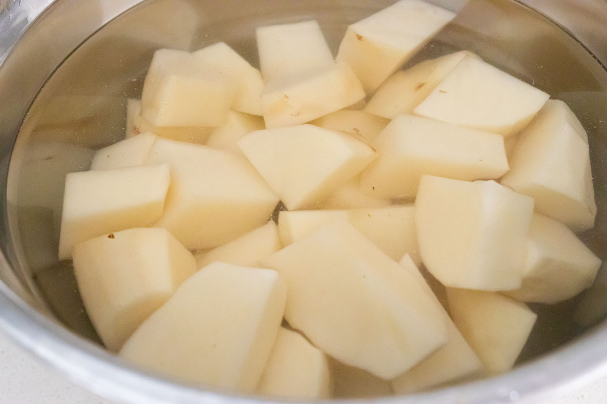 Potatoes soaking in water.