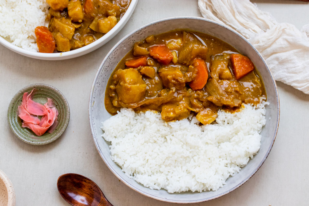 Vegetarian Japanese curry with carrots, potatoes and mushrooms.