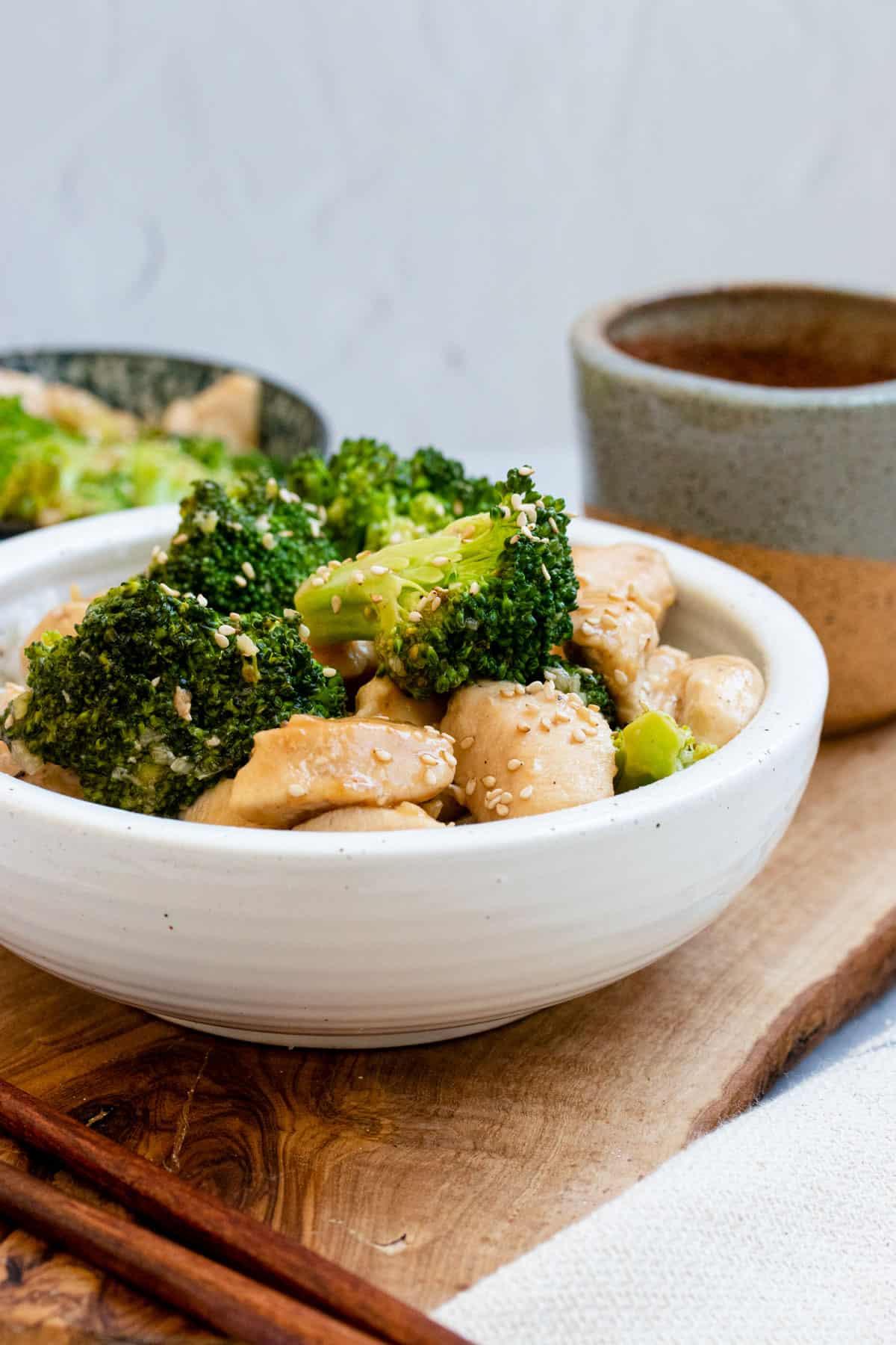 Chinese chicken and broccoli with brown sauce and topped with toasted white sesame seeds.