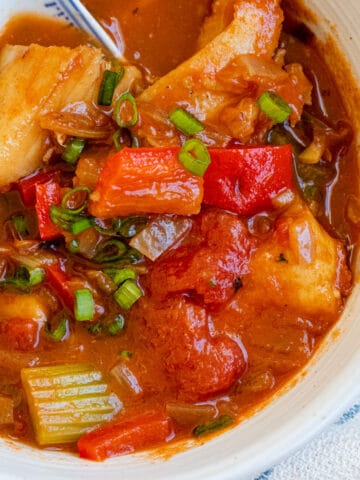 Tomato fish stew in bowl.