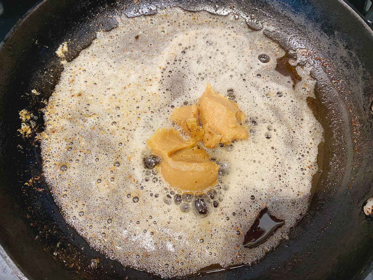 Mixing miso with brown butter.