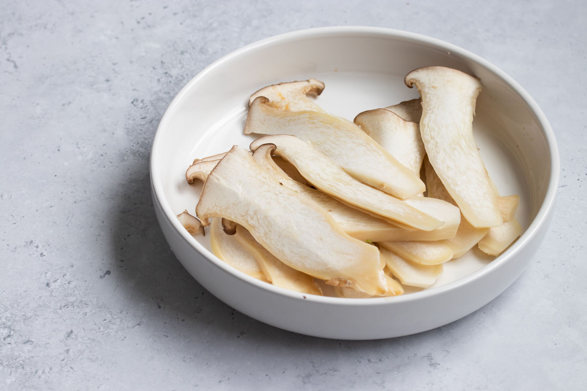 Sliced king oyster mushrooms.