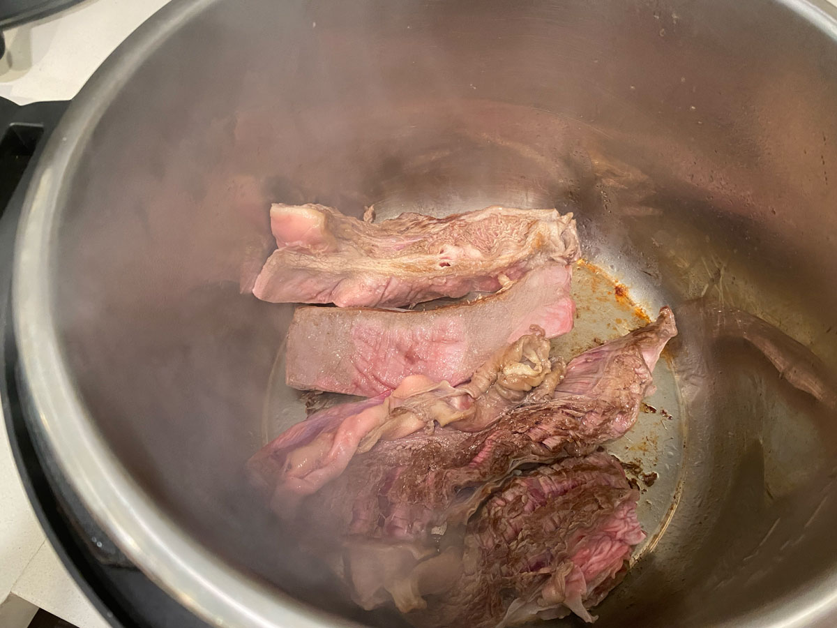 Sear the beef in the Instant Pot.