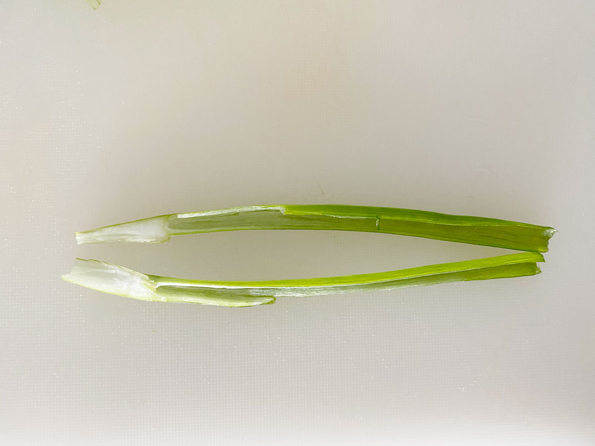 Slice scallions lengthwise.