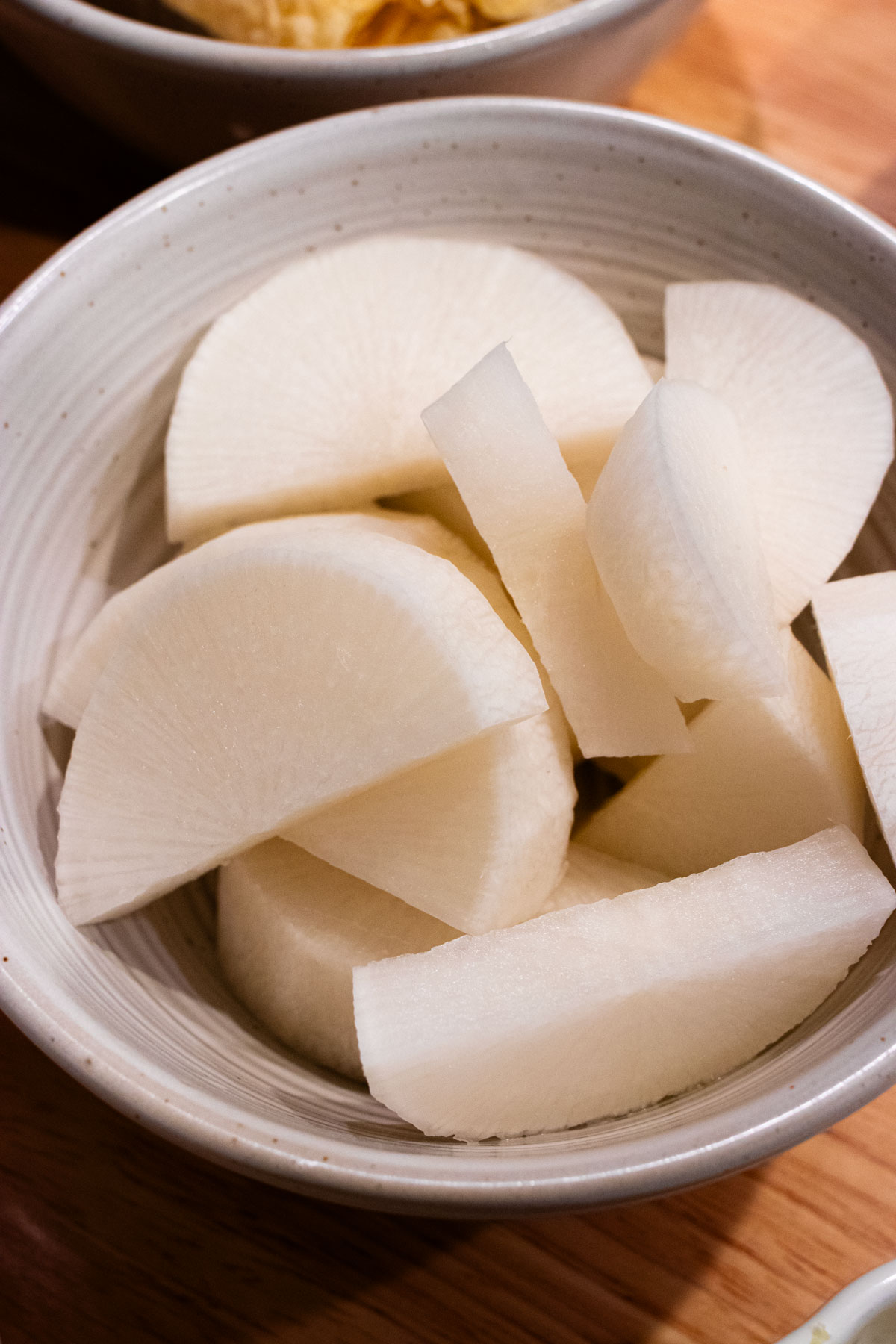 Sliced and diced daikon radish.