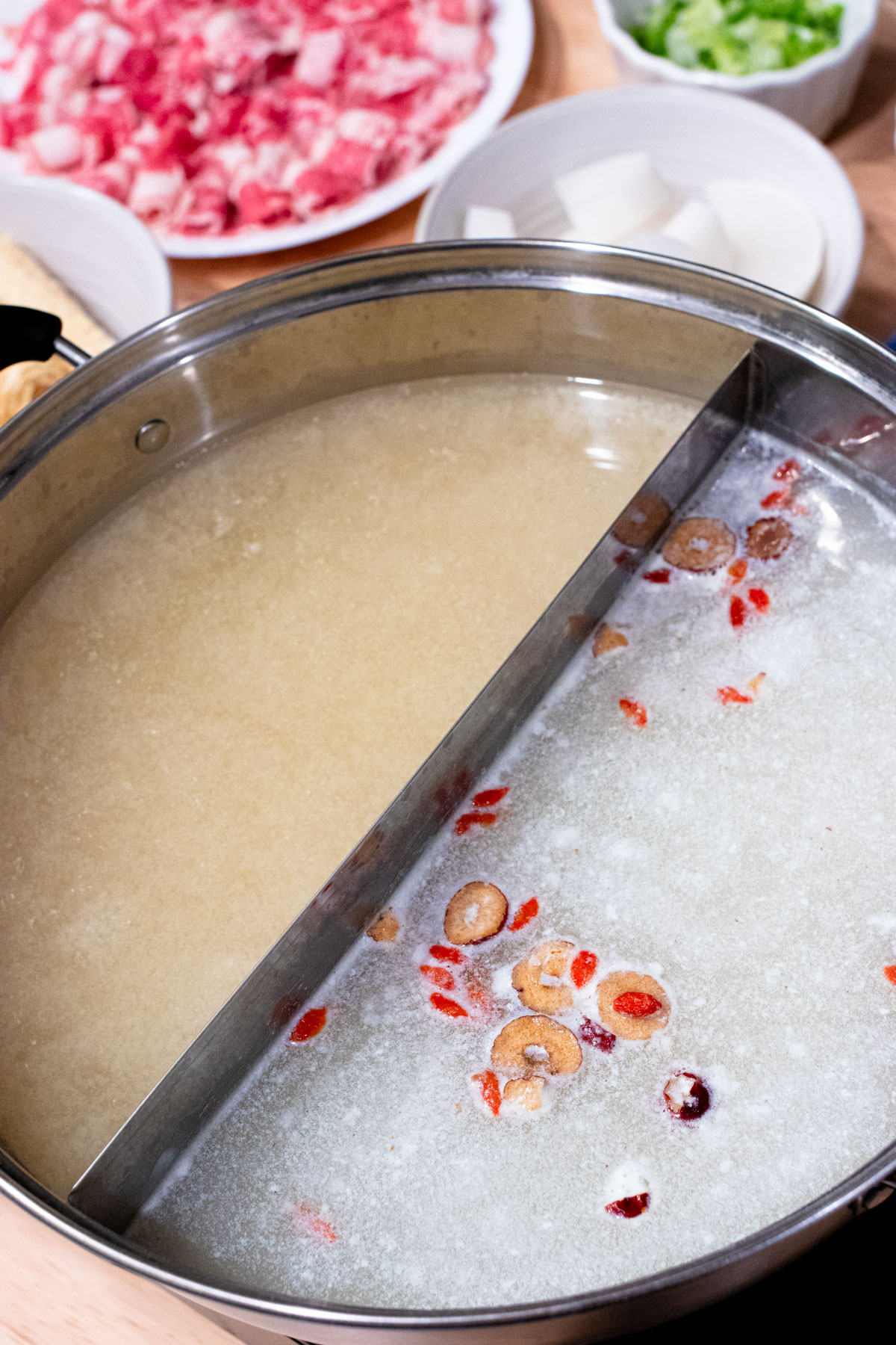 Split hotpot pot with different broths.