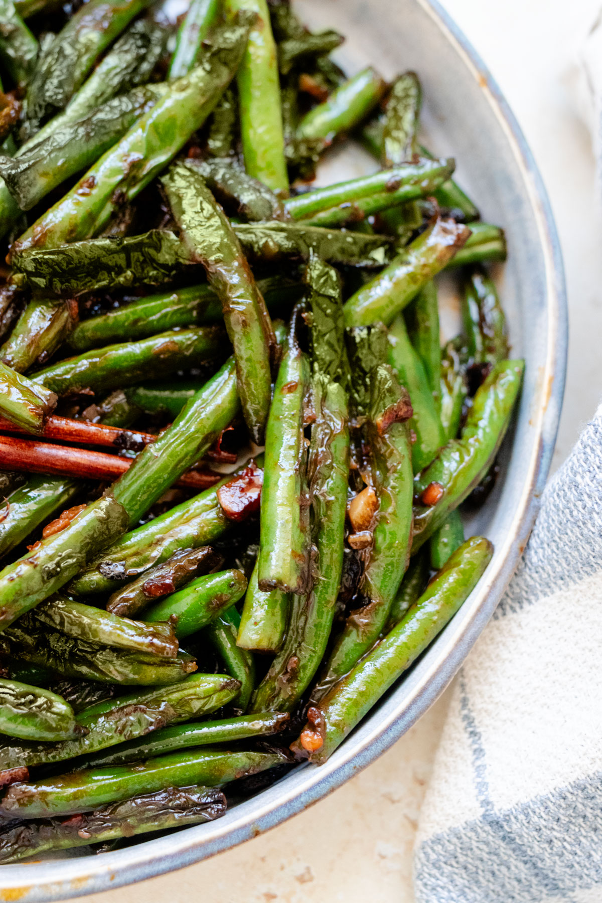 Chinese stir-fry green beans on a plate.