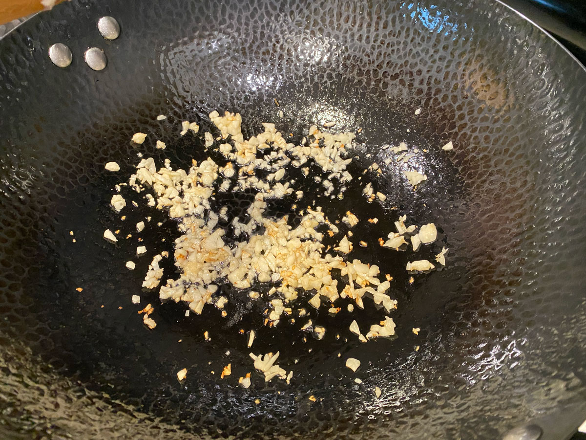 Minced garlic in wok.