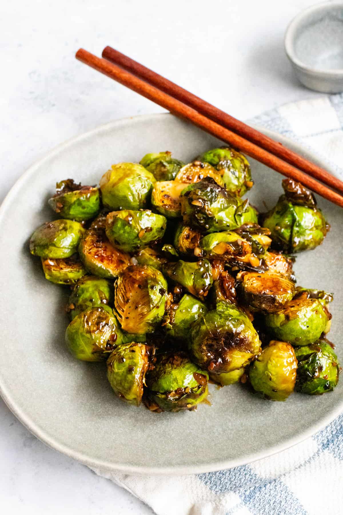 Kung pao brussels sprouts on a plate.