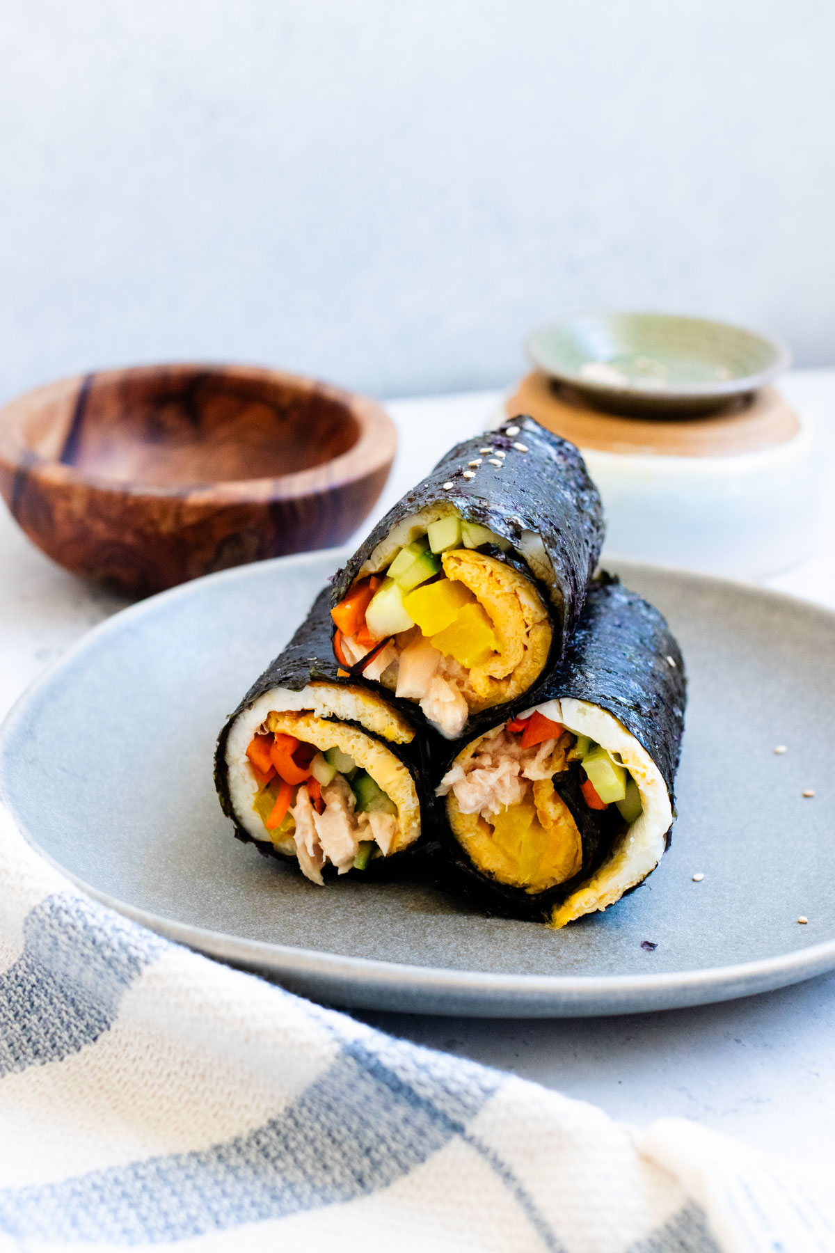 High protein low carb kimbap with egg, cucumber, carrot, tuna, and pickled daikon.