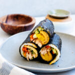 High protein low carb kimbap with egg, cucumber, carrot, tuna, and pickled daikon.